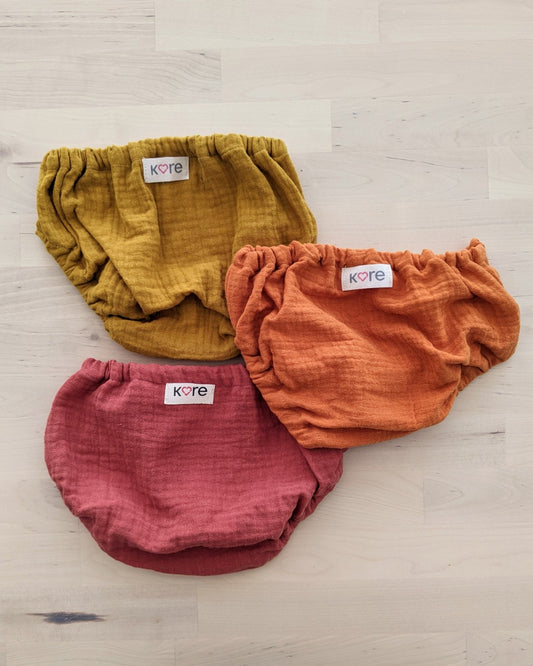 Copripannolino in mussola